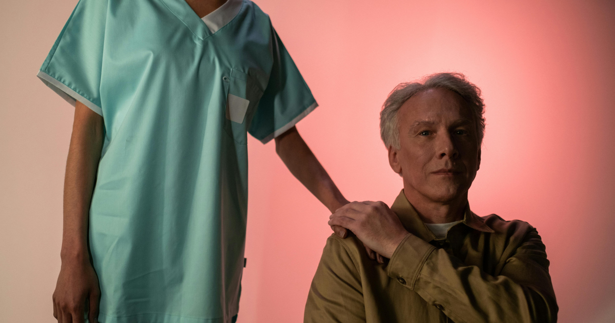 Dementia care: Nurse supports elderly man. Understanding dementia causes, symptoms, and solutions for compassionate care.