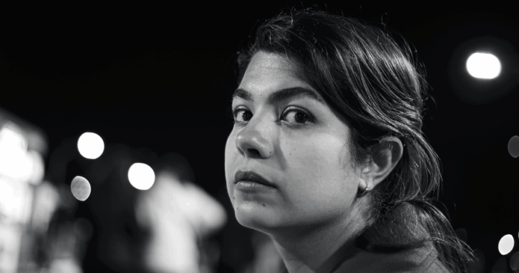 Black and white portrait of a woman showing inner strength, relevant to impulse control disorders and mental wellness.